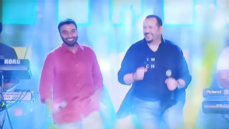 فرقة هشام عباس وحميد الشاعرى بالكمامة بحفلة لايف.. شاهد