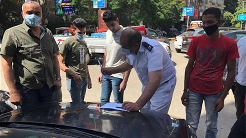 تحرير 18 محضرا لغير الملتزمين بارتداء الكمامات بالدقي