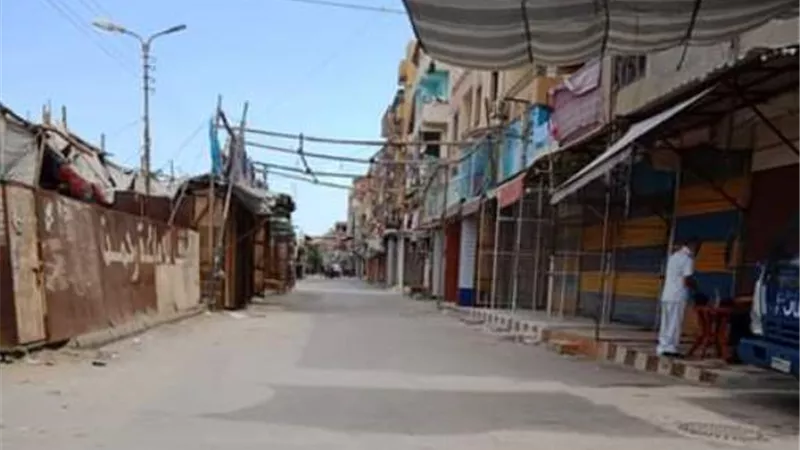 المحلات التجارية بالقنطرة غرب تلتزم بقرار الغلق التام لمواجهة كورونا.صور
