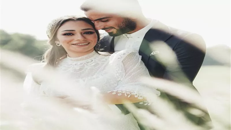 أول تعليق من راندا رياض بعد عقد قرانها على محمد الشرنوبى