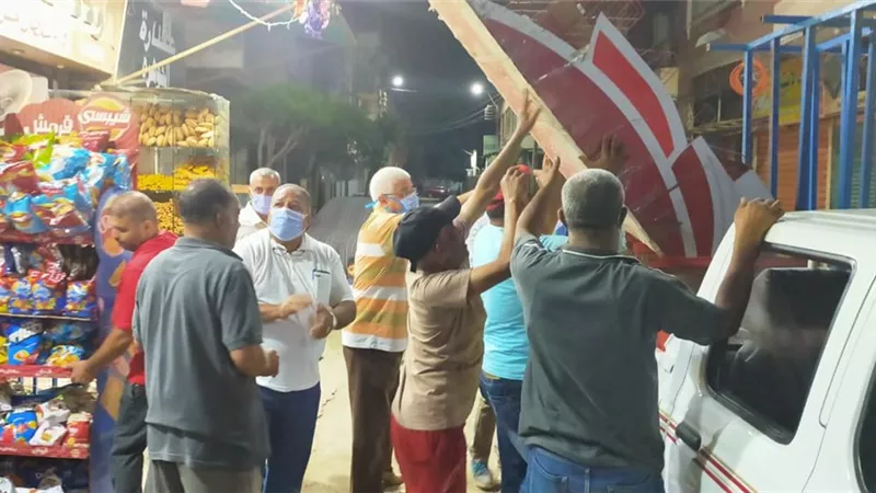 غلق وتشميع محل ورفع اشغالات محلات وافران ببنى سويف