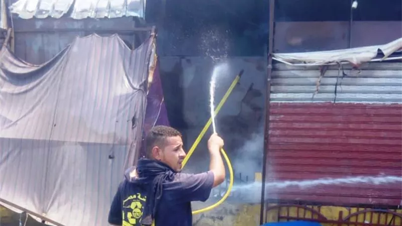 انتهاء تبريد ٥١٤ باكية بحريق سوق توشكى بحلوان فى القاهرة.. بالصور