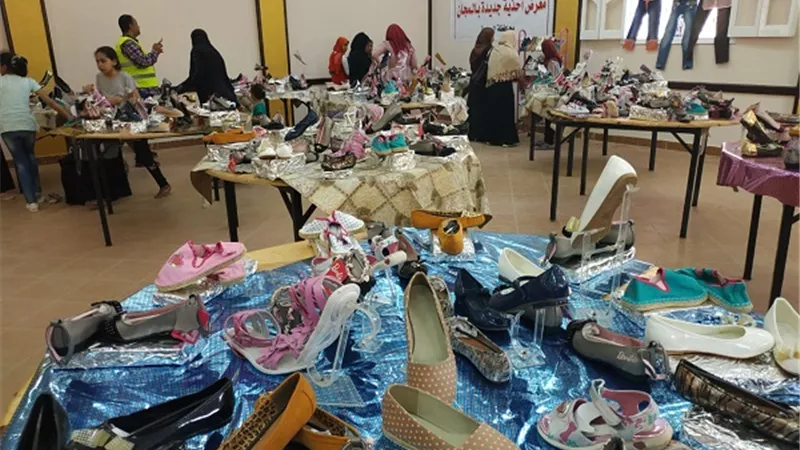 الأورمان تنظم معرضاً للملابس والأحذية بالمجان للأسر الأولى بالرعاية