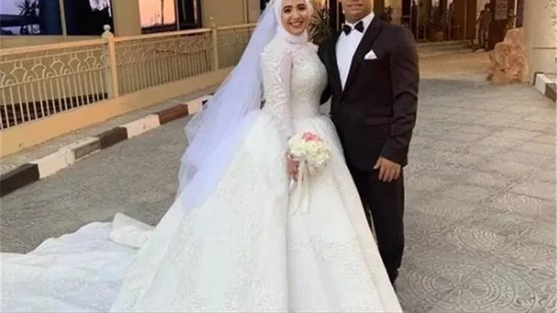 بطل مصر فى رفع الأثقال يعلن زواجه على نورهان مكرم.. شاهد