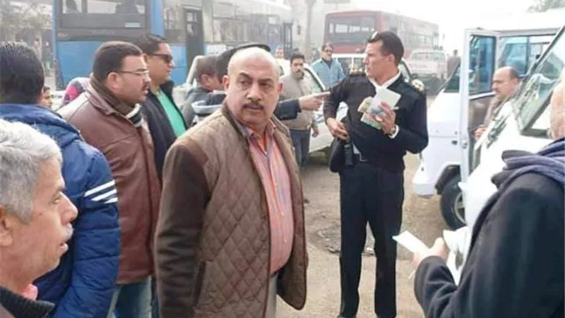 نقل موقف عشوائى امام مستشفى ام المصريين بالجيزه لموقف المنيب