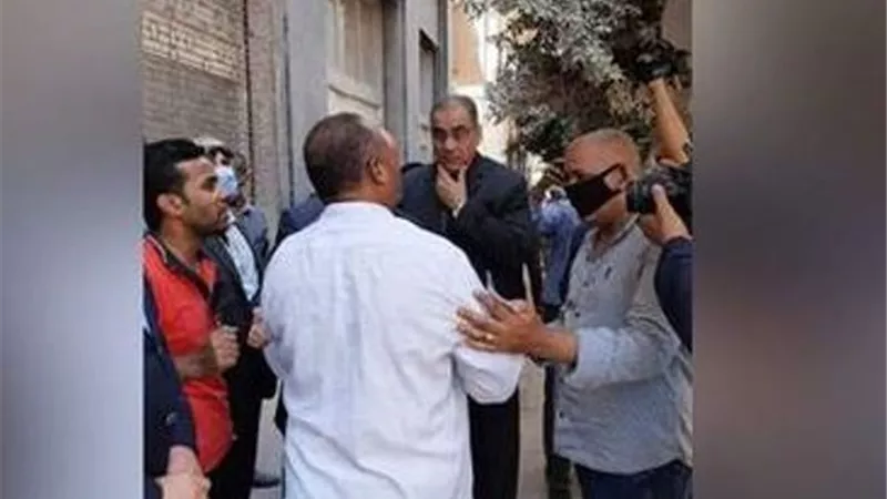 اجهزة الامن تخلى 3 مبانى مجاورة لعقار قصر النيل المنهار