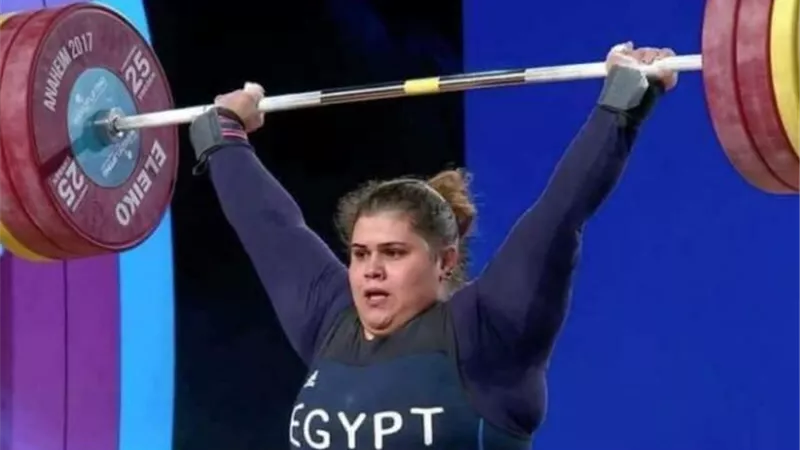 بطلة رفع الأثقال شيماء خلف ترد على تكذيب القناة القطرية عبر الفيس: 