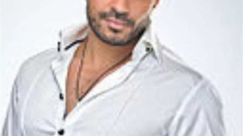 خالد سليم يحتفل بوصول برومو برنامجه 