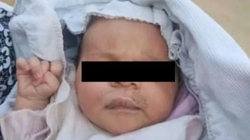 تفاصيل العثور على رضيعة بمدخل عمارة في الكوثر بالسويس