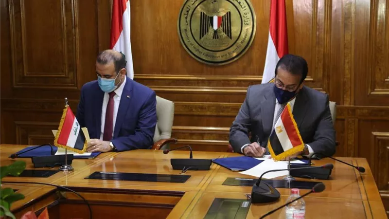 وزيري التعليم العالي والتخطيط العراقي يوقعان برنامج للتعاون بين البلدين