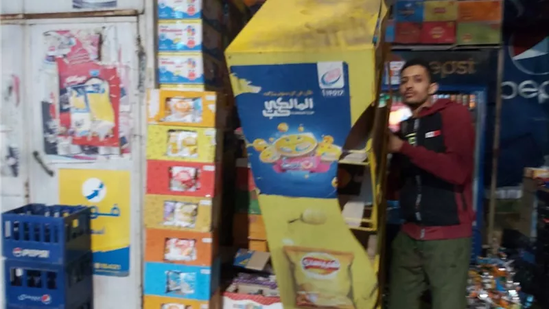 حملة مكبرة بالدقي لرفع الاشغالات والمخالفات.. صور