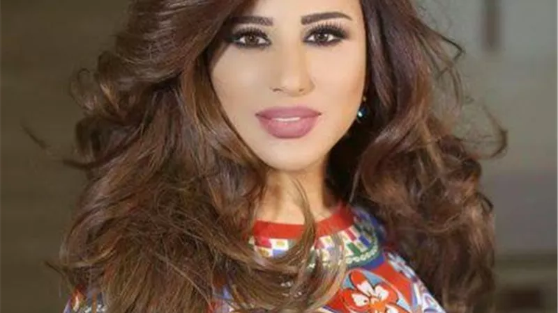 اطول فستان وصفه الجمهور للفنانة نجوى كرم .. صور