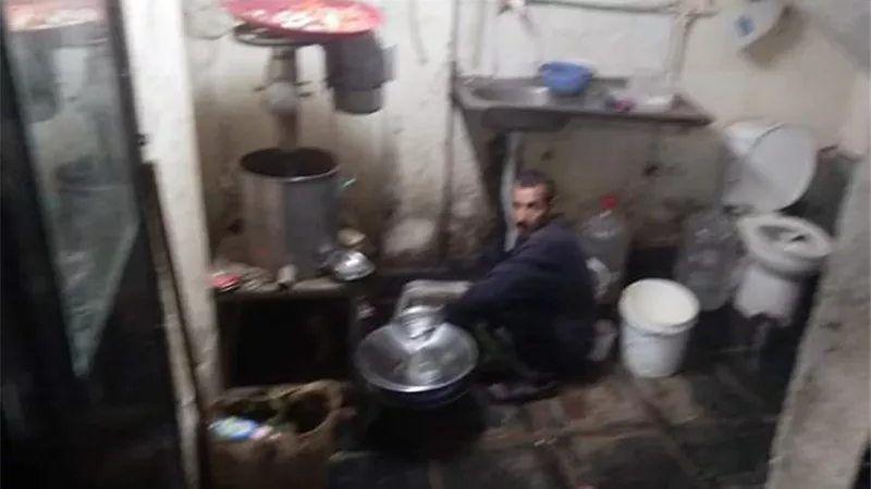 اغلاق مطعم بالجيزه لطهي مأكولاته داخل دورة مياه