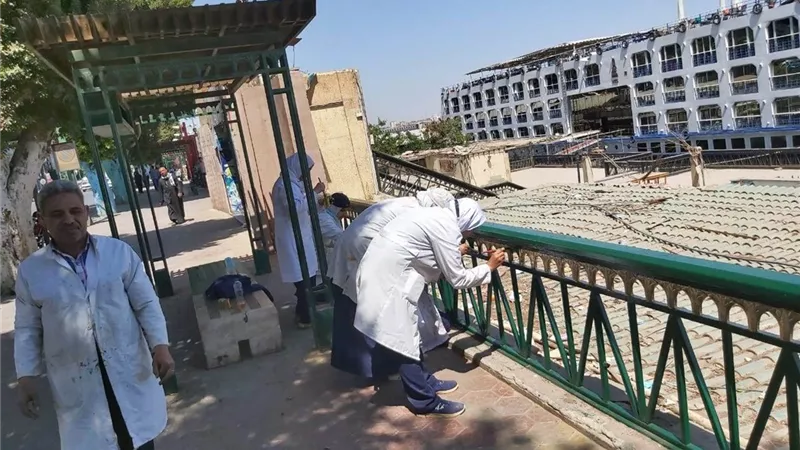 استكمال أعمال التطوير والتجميل لميادين وشارع محافظة أسيوط