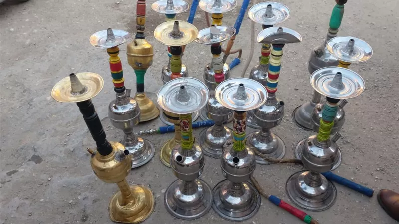 مصادرة 32 شيش وتشميع بعض المقاهي المخالفة بأسيوط