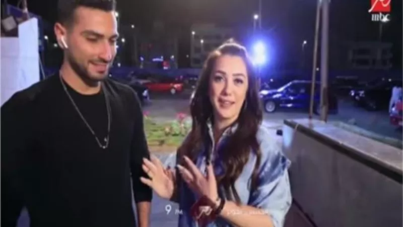 كندة علوش تصدم زجاج معرض سيارات