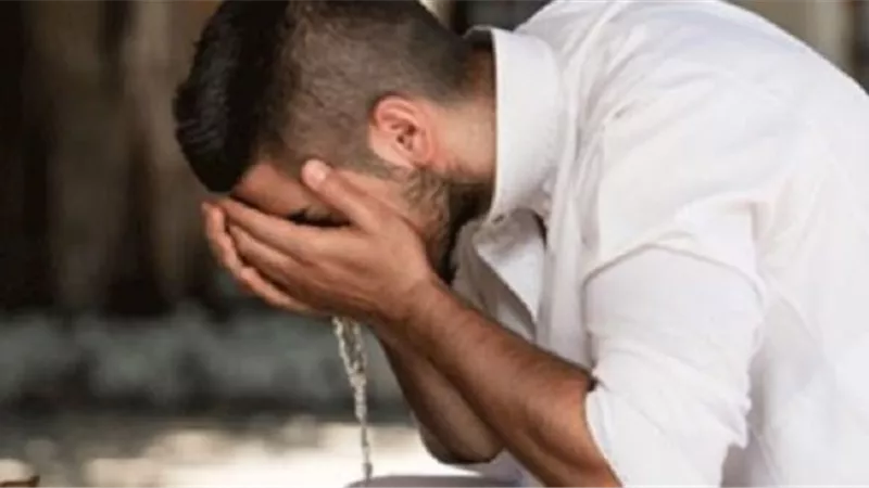 هل الشعور بماء في الحلق عند الوضوء يفسد الصيام؟ .. دار الإفتاء تجيب