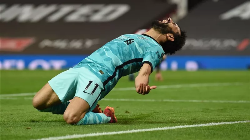 محمد صلاح ليفربول يدخل التاريخ من بوابة مان يونايتد ملك الدورى الانجليزى.. صـــور
