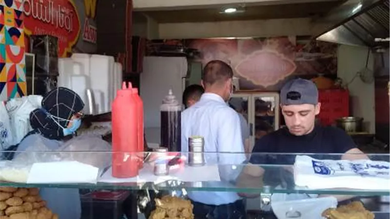 ١٢٣ محضر عدم إرتداء الكمامة وإغلاق ٣ مقاهي ومنطقة ملاهي في دمياط..صور