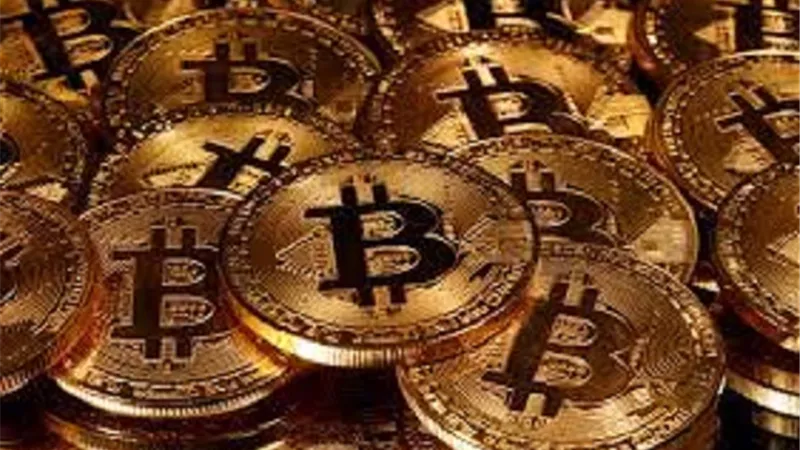 حكم التعامل بالعملات الرقمية مثل البتكوين؟ .. دار الإفتاء تجيب
