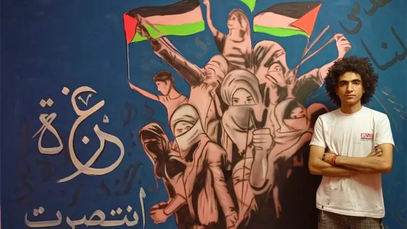 شاب مصري يوثق بطولات الشعب الفلسطيني بالجرافيتي