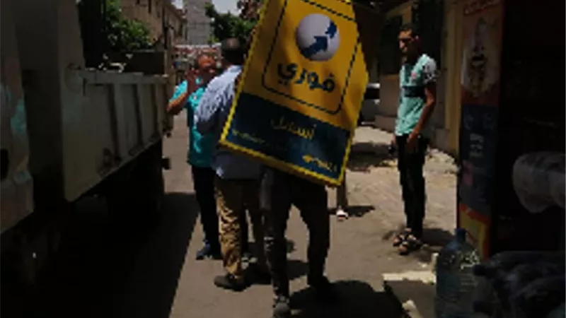 ازالة أعمال بناء مخالف ورفع التعديات بحى وسط فى الإسكندرية.. بالصور