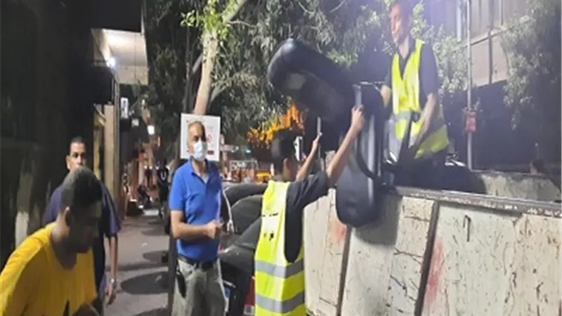 حملات علي المقاهي والمحال والباعة المتعدين علي الطريق العام بالدقي والعجوزة والهرم