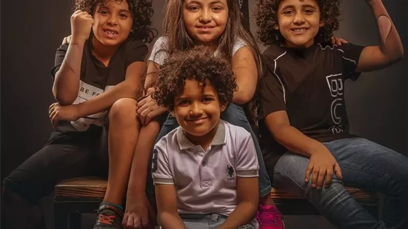 أطفال يدعمون مرضي البهاق بجلسة تصوير