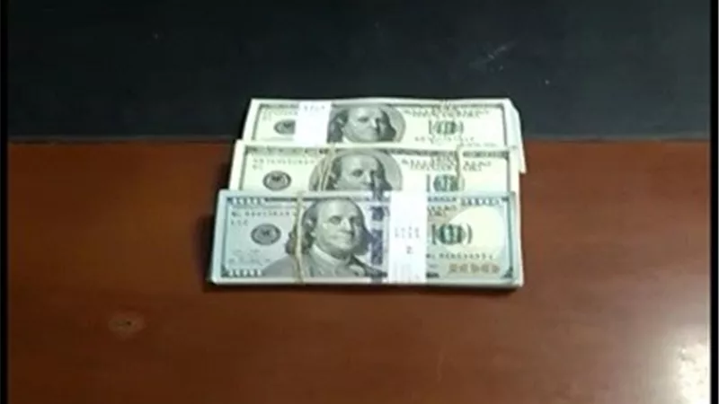 احباط محاولة تهريب 30 الف دولار امريكي الى الصين
