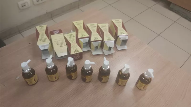 ضبط راكب بمطار القاهرة بحوزته زجاجات كونترمال المخدر