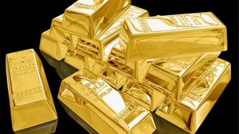 صعود الذهب وتراجع الدولار عن أعلى مستوياته