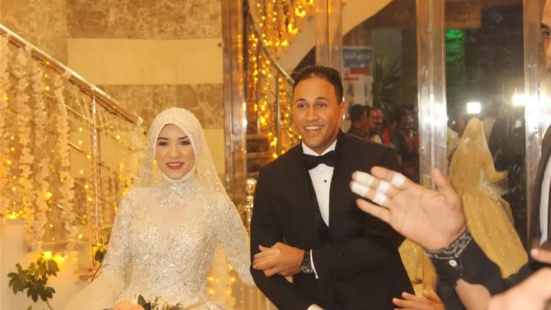 مبروك زفاف د.اسماء الطاروطى واحمد الملتزم