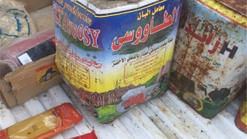 التموين تضبط كميات كبيرة السلع الغذائية منتهية الصلاحية..صور