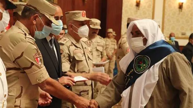 الجيش الثانى الميدانى يكرم أسر الشهداء ومصابى العمليات الحربية