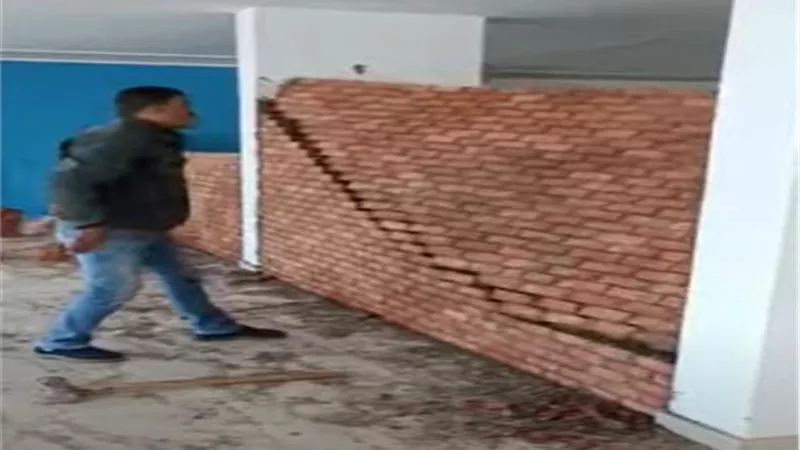 ضبط وازاله ١٣ حاله تحويل وحدات سكنيه لمحلات بحدائق الاهرام