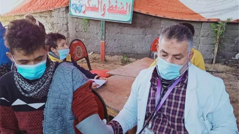 الكشف على ١٨٠٠ مريض بالقافلة الطبية فى بحر البقر.. صور