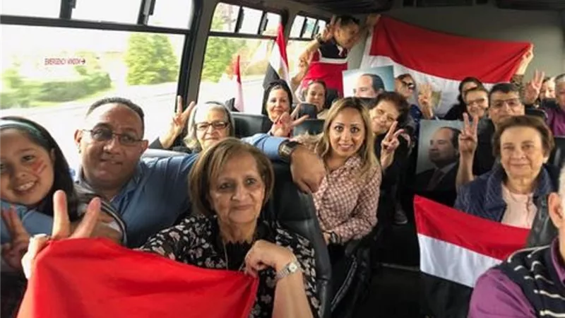 بالأعلام ..المصريون في نيوجيرسي يتوجهون لصناديق الاستفتاء...صور