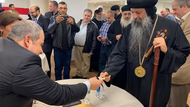 بالصور.. قيادات الكنيسة تشارك فى التصويت بنيويورك