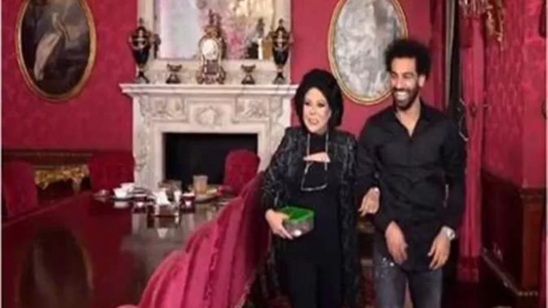 صلاح مع صاحبة السعادة: 