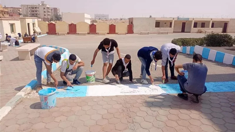 جوالة جامعة بني سويف تنفذ مشروع خدمة عامة بالمدن الجامعيه