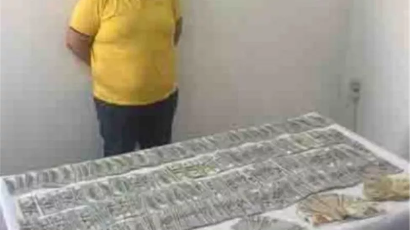 ضبط تاجر عملة .. بالقاهرة
