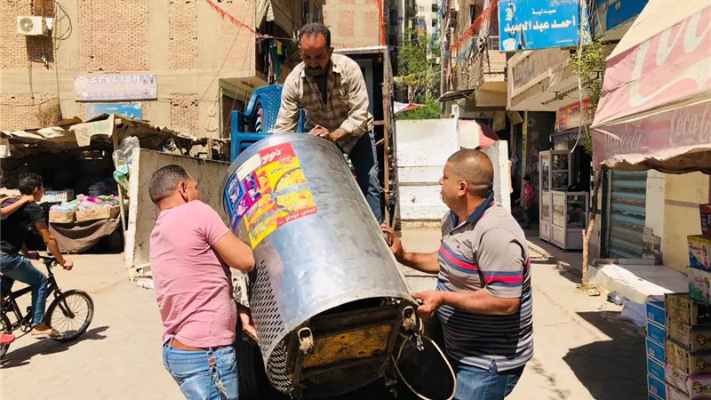رفع ١٧٠٠ حاله اشغال للمحال والباعة الجائلين بالوراق والعياط والبدرشين