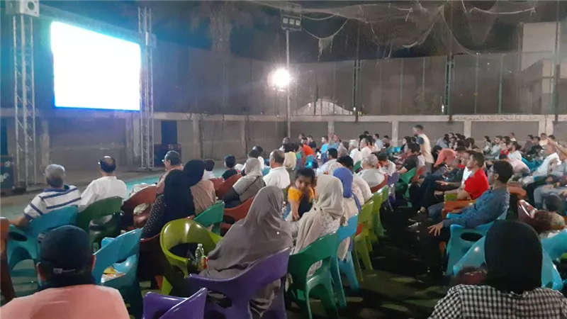 بالصور.. استعدادات مكثفة وشاشات عرض لمتابعة مباراة الأهلي والوداد بنادي مهندسين أسيوط