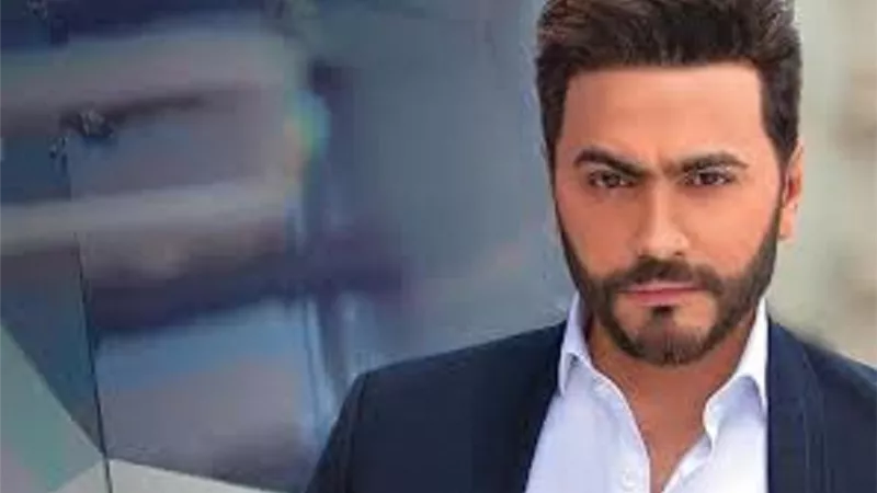 تامر حسنى يشجع ابنته تاليا بعد التقاطها صورة له