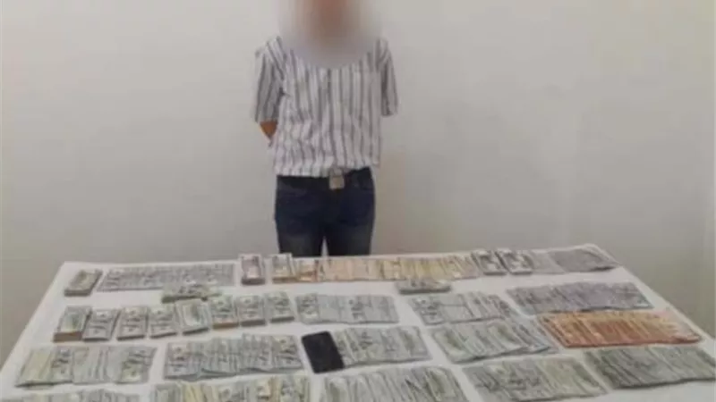 ضبط عامل بتهمة الاتجار فى العملة .. بالقاھرة