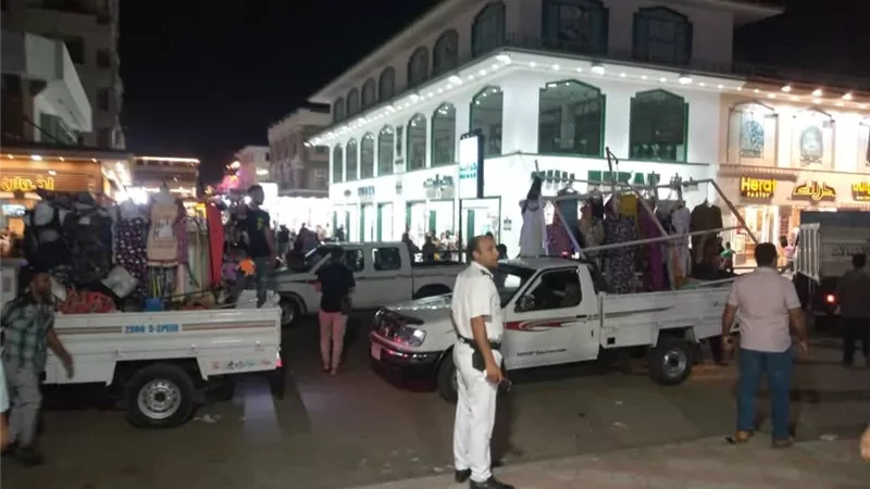 إزالة الإشغالات بشارع النيل والسوق السياحى برأس البر