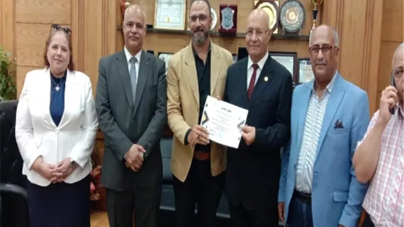 سوسه يكرم مندوبى المالية بجامعة بنها.. صور