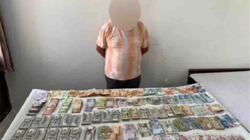 ضبط شخص يتاجر في النقد الأجنبي بالخليفة