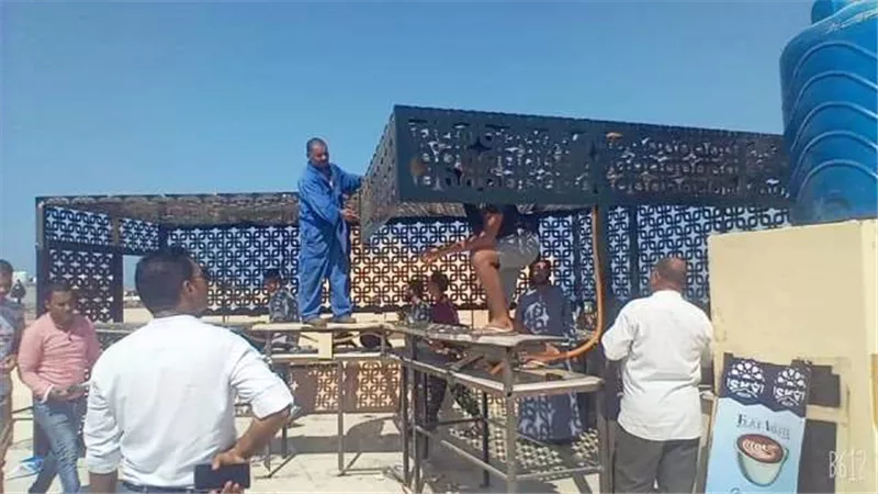 لجنة لإزالة إشغال أعلى سطح العقار بمول القصير