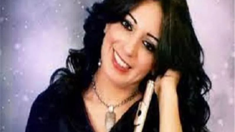 د. رانيا يحيى عازفة الفلوت في حفل 